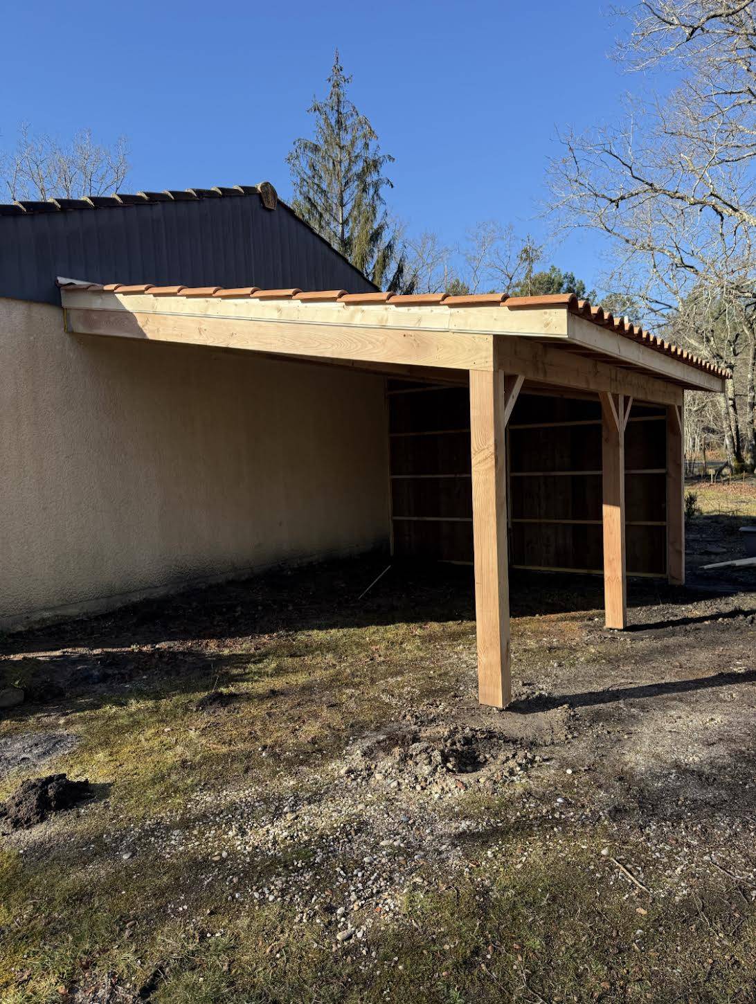 Combien coûte la fabrication et pose d'un carport bois pour abriter deux véhicules à Blanquefort ?